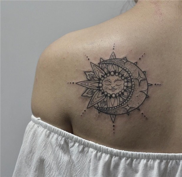 Sun tattoo on scapula black and grey by Dauren Usenov Should