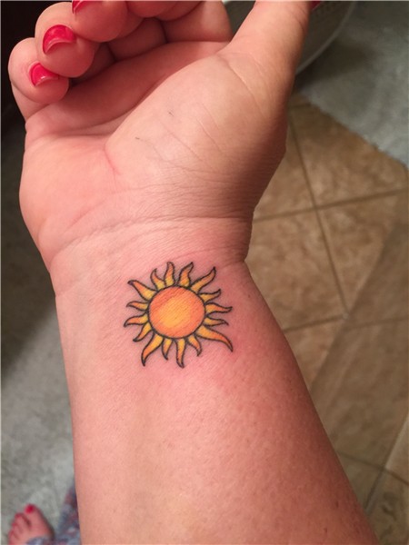 Sun tattoo on wrist with color. You are my sunshine Sun tatt