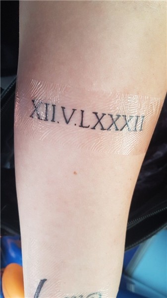 Tattoo 17. Roman Numerals, on my left inner arm (My brothers