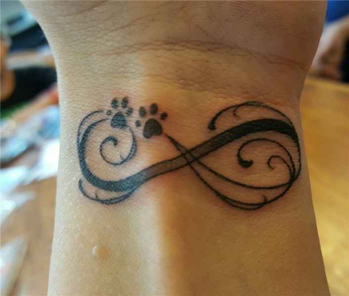 Tattoo Infinity symbol with paw prints. Print tattoos, Infin
