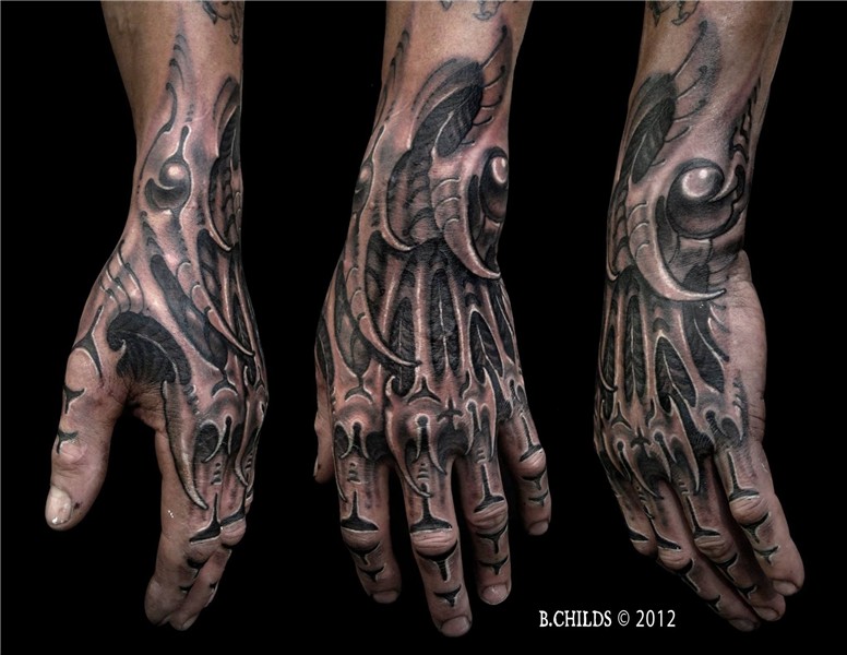 Tattoo by B. Childs Skeleton hand tattoo, Biomechanical tatt