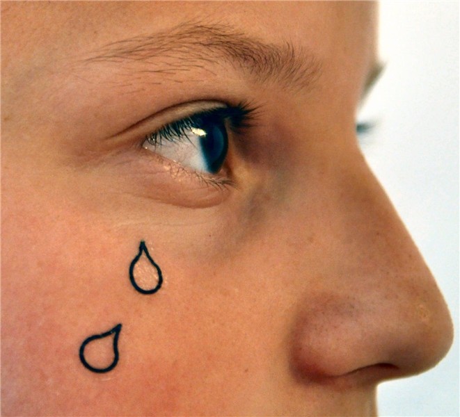 Tear under the eye tattoo: meaning, 150 photos and the best