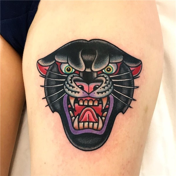 Traditional angry black panther tattoo on the left thigh Pan