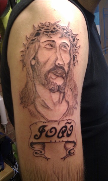 Tribal christian Tattoos