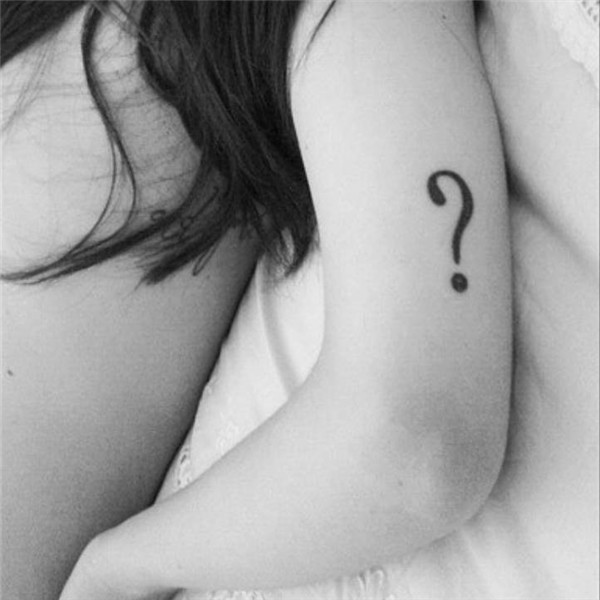 Tricep tattoo of a question mark on Jessica.