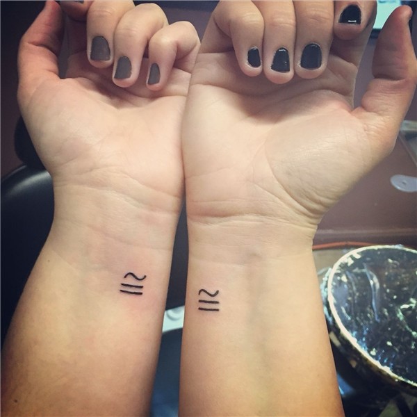 Twin tattoo, the mathematical symbol for congruence- meaning