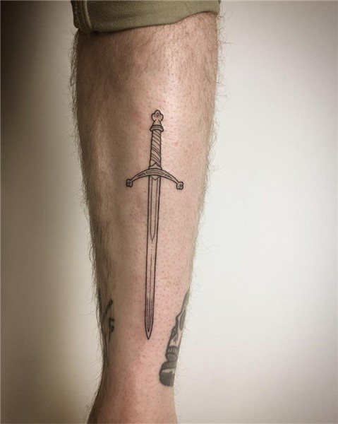 Two-handed broad sword tattoo by Kirk Budden - Tattoogrid.ne