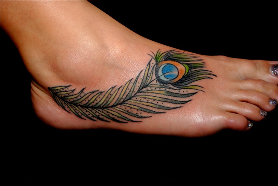 Wallpaper Peacock feather tattoo on leg on black background