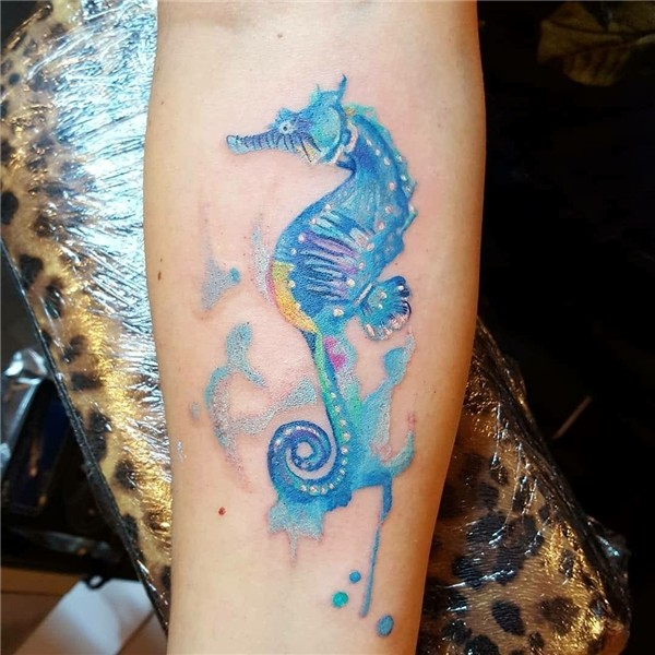 Watercolour seahorse tattoo. Nautical ocean ink. Blue rainbo
