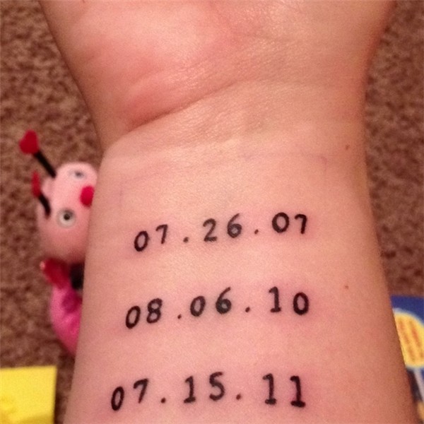 Wrist tattoo is children's birthdays. I like the