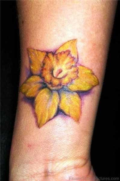 Yellow Daffodil Flower Tattoo On Wrist Yellow flower tattoos