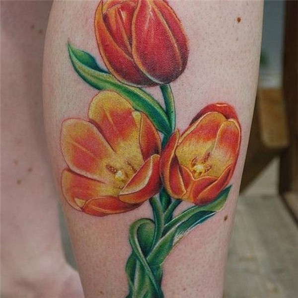 http://tattoomagz.com/colorful-tulip-tattoos/yellow-and-oran