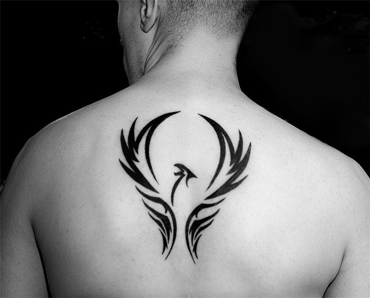 one of my favorite placements Tribal phoenix tattoo, Phoenix