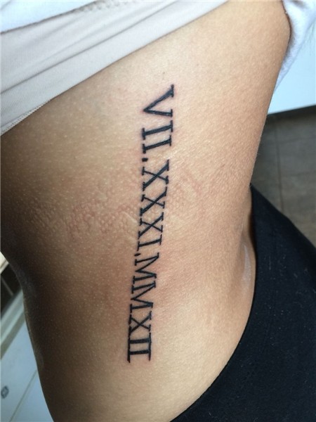roman numeral tattoo down side. VII.XXXI.MMXII meaning July