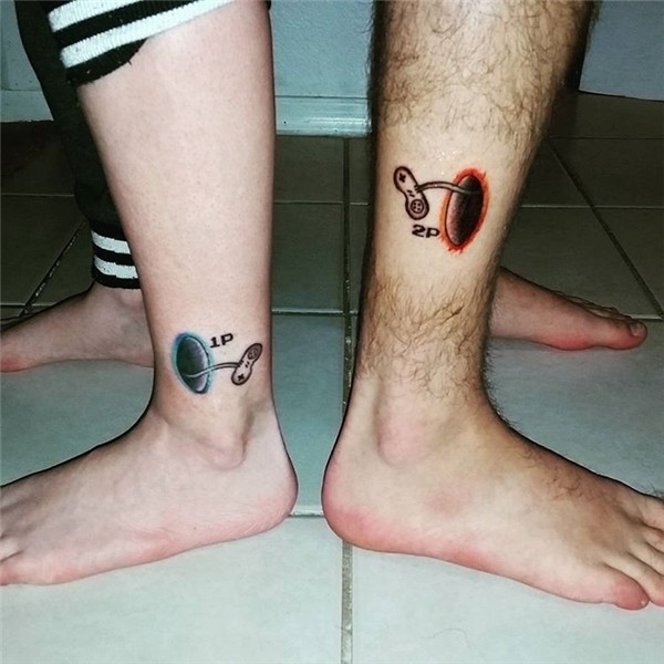 the Portal/gaming tattoos me and my lil bro got together tod